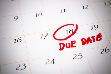 Due Date day, the 18th, Red circled mark on a white calendar, as a reminder of the date your project...