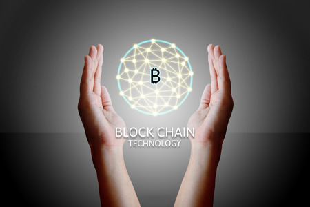 Blockchain technology concept, Woman holding virtual system diagram bitcoin and data protection.
