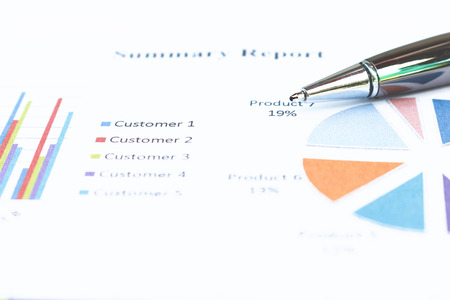 Close up business concept, Pen is on summary report on paperwork on table office.の写真素材