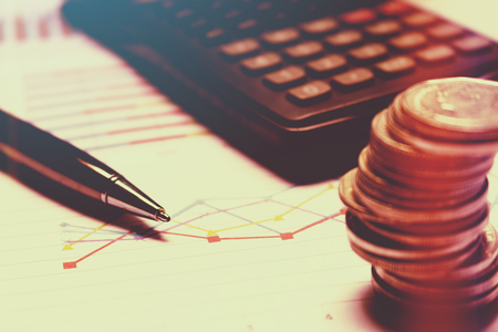 Finance savings concept, business equipment on paperwork.の写真素材