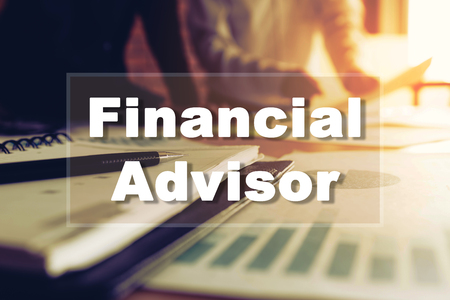 Two people standing discussion meeting with table and expert advice financial advisor.の写真素材