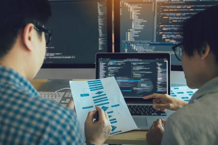Developing programming and coding technologies working in a software engineers developing...