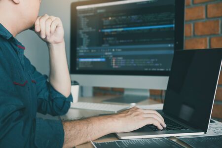 Developing programming and coding technology working in a software develop company office.の写真素材