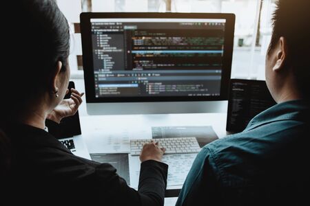 Professional development programmer cooperating meeting programming website working a software in...