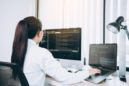 Developing programming and coding technology working in a software engineers developing applications...