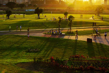 Taipei, Taiwan - October 13, 2013: A group of people engaged in recreational activities in the park in the summer afternoon.のeditorial素材