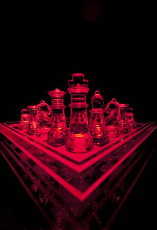 Glass Chess Board and Pieces in Redの写真素材