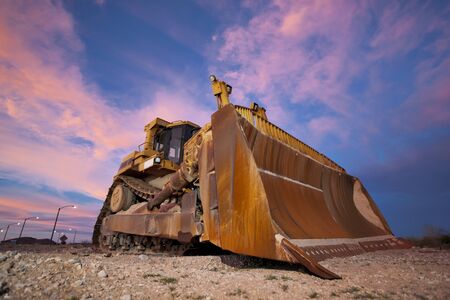 Heavy Construction Equipment Bulldozer against skyの写真素材