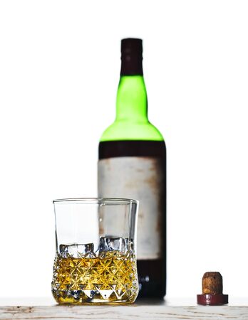 Whiskey Bottle and Cork and Crystal Tumblerの写真素材