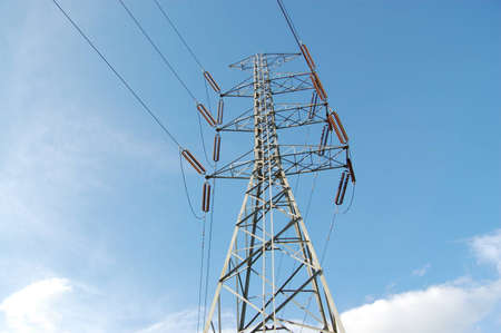 Huge pylon transfer high voltage electric front of blue sky background