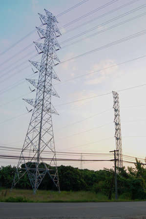 Huge pylon transfer high voltage electric front of blue sky background