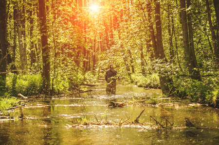 Fishing with tenkara on a small creek. Flyfishing.の写真素材
