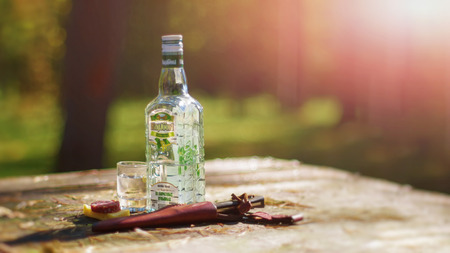 Minsk region, Belarus - September 25, 2010: A bottle of Belarusian vodka Naliboki and a sandwich, a...