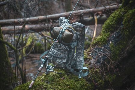 Catching trout on a forest stream. Fishing with spinningの写真素材