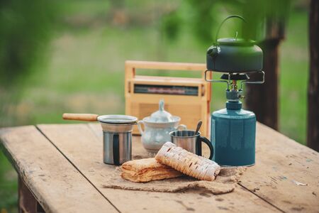 Biscuits and coffee cooked outdoors.