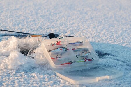 Winter fishing tackle. Fishing on the ice.の写真素材