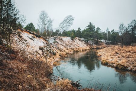 Beautiful river in the misty, pre-winter day.の写真素材