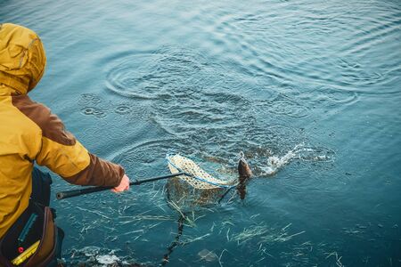 Sport fishing area trout. Trout fishing spinning.の写真素材
