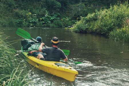 Canoeing on the forest river.の写真素材