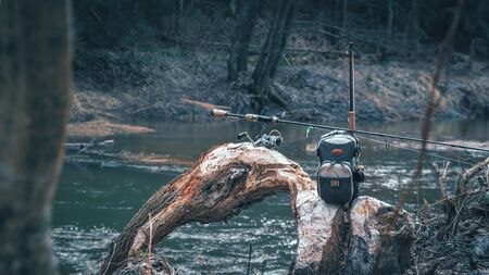 Fishing gear on the river bankの写真素材