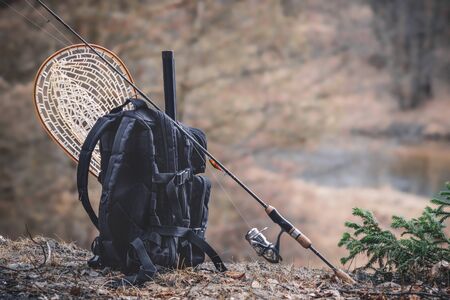 Fishing gear on the river bank.の写真素材