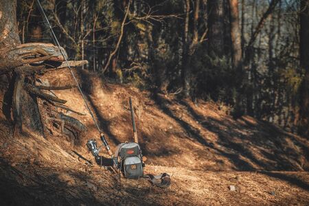 Fishing gear on the river bankの写真素材
