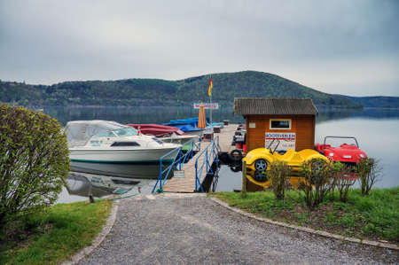 Germany Neighborhoods Ederzee lake. April 29.2012: Pleasure boats on the lake.のeditorial素材