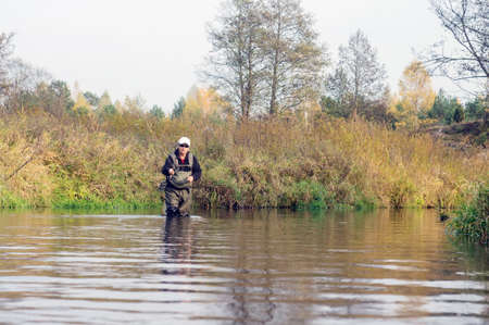 Fisher throws the rod.の写真素材