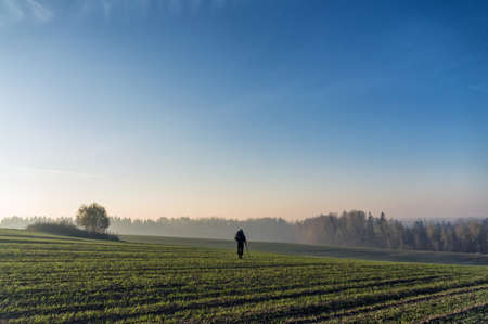 Man holds demining on the field.の写真素材