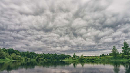 Clouds over the riverの写真素材