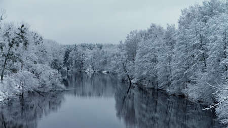 Snow-covered winter riverの写真素材