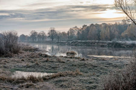 Surface of the autumn river. Dawn. Oakwood.の写真素材