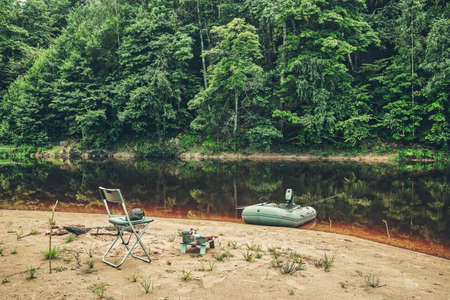 Fishing from an inflatable boat. Lunch on the beach.の写真素材