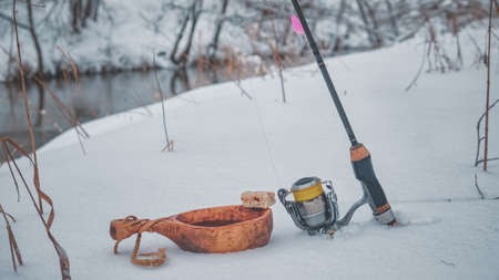 Drink tea during winter fishing.の写真素材