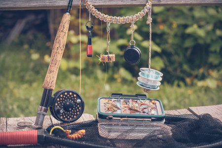 Fly fishing gear against the backdrop of a village courtyard.の写真素材