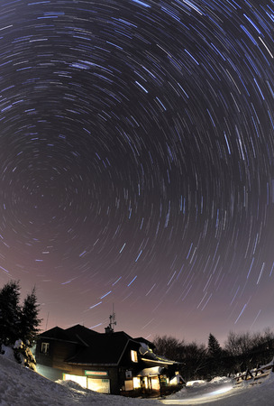 Beskydy, Czech Republic - January 29, 2012: sky full of stars from hill Ostry bei chalet