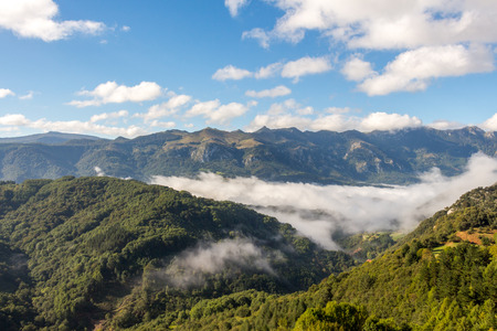 Landscape view with clouds and mountains in the Spanish Pyreneesの写真素材