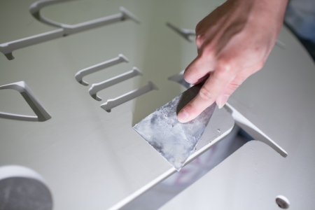 a worker was repairing decorative materialsの写真素材