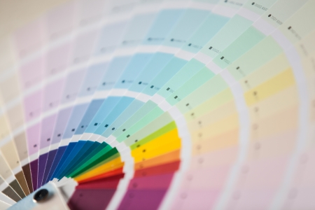 covered in white on a rainbow color cardの写真素材