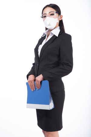 black hair girl with a mask on her face  Isolated on whiteの写真素材