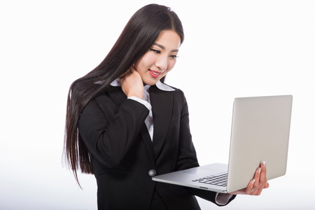 business woman and notebook. Isolated over white backgroundの写真素材
