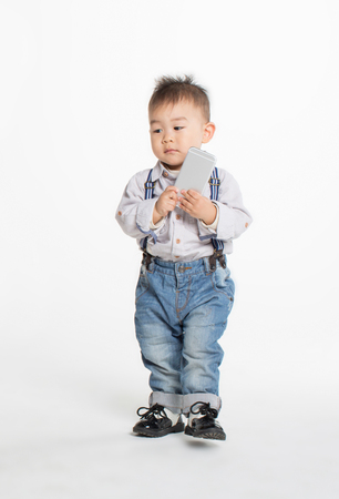 Portrait of a cute chinese baby boyの写真素材