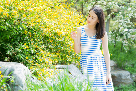 chinese young woman enjoying the natureの写真素材