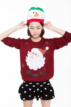Woman wearing snowman hatの写真素材