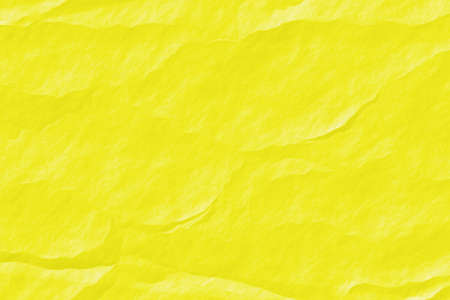 Yellow crumpled paper background.Abstract texture paper.の写真素材