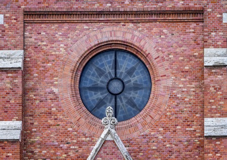 Close up photo St. Matthias Church in Budapest. One of the main temple in Hungary. There are red bricks and dark glass.の写真素材