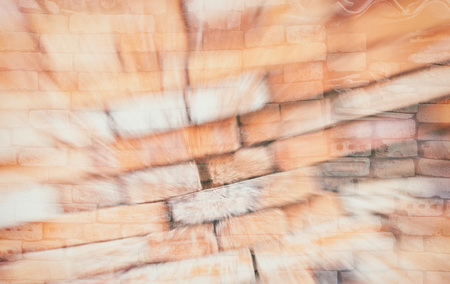 Double exposure of the stonewall from old bricks. It is retro style background or texture.の写真素材