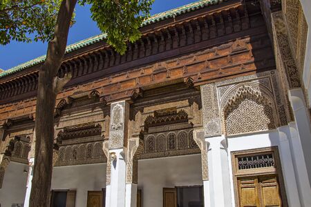 Detail of islamic building. It is an old architecture in the middle of the Moroccan city. There are...