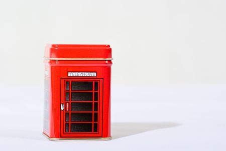 Small red telephone booth form metal box