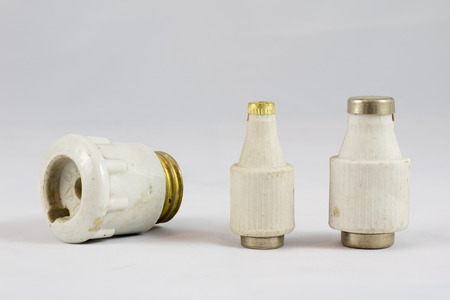 Old electric fuses on white isolated backgroundの写真素材